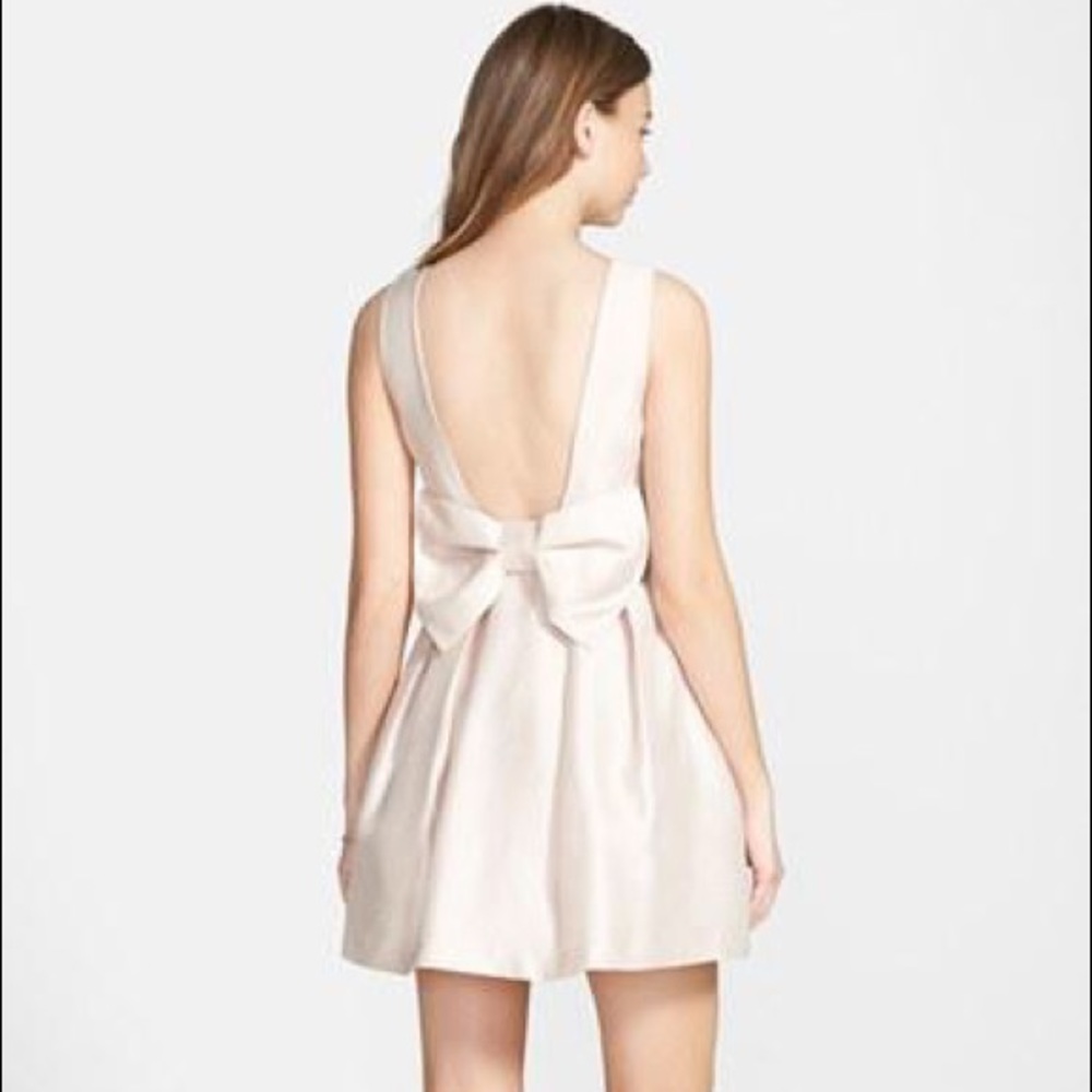 EUC Soprano Bow Back Fit and Flare Dress